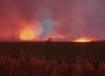 A wheatfield at dusk transformed into an inferno when a fire erupts.